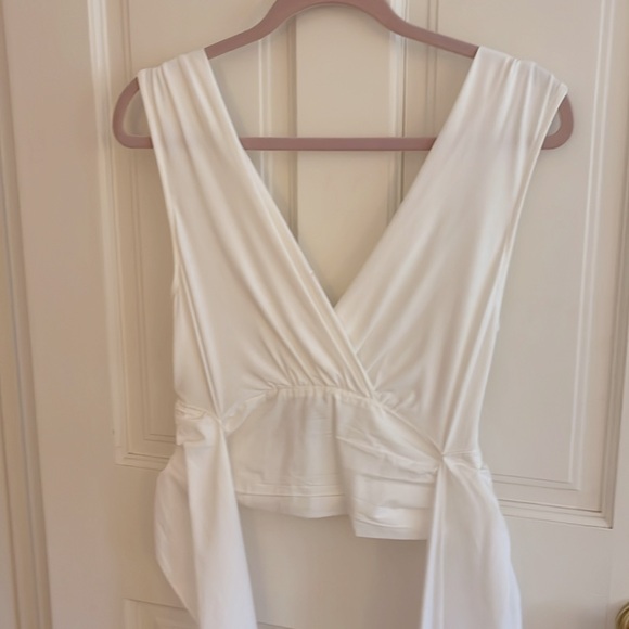 Vneck sleeveless wrap tie blouse. - Picture 4 of 7